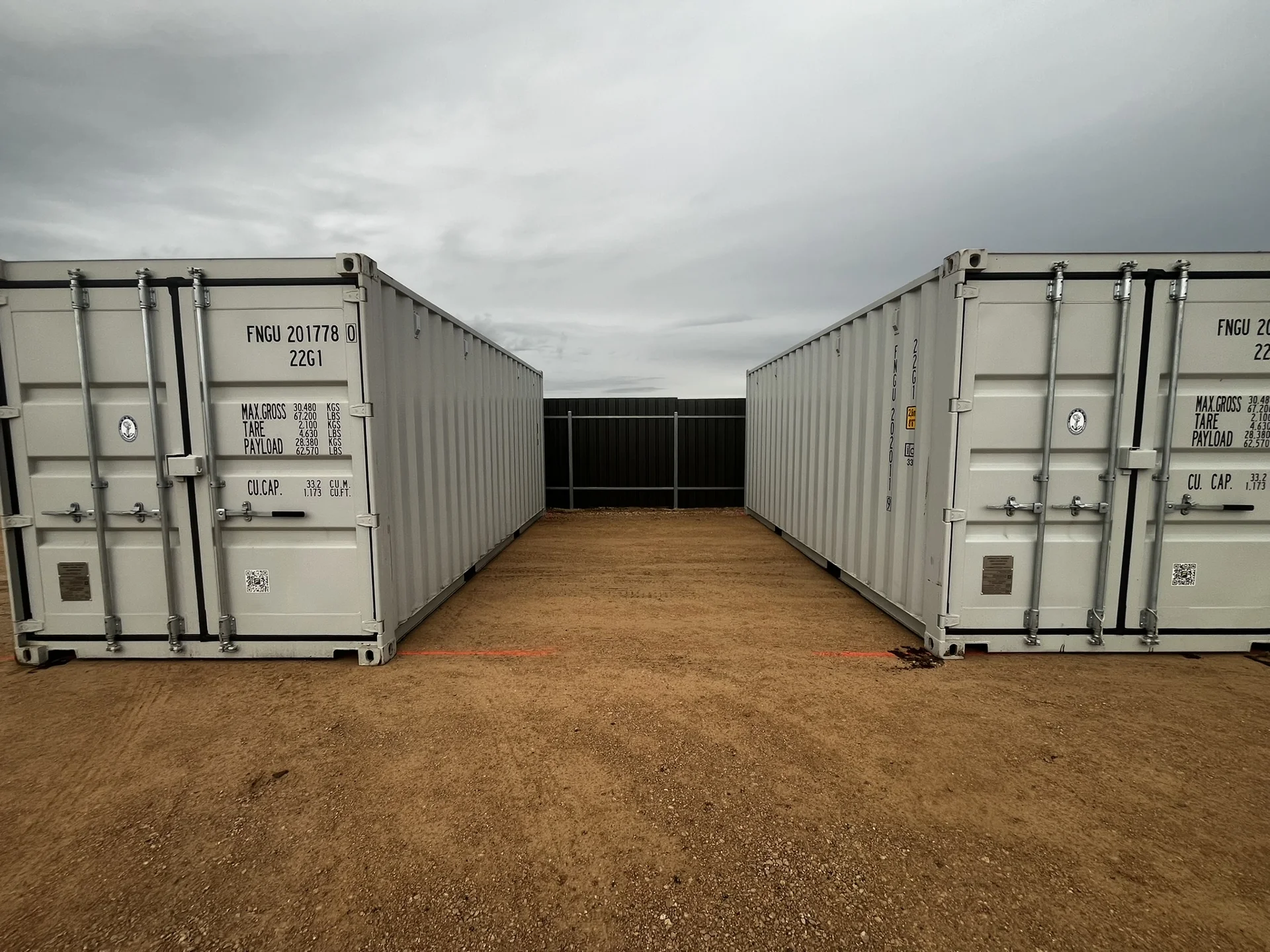 Storage containers and solid perimeter fencing at Tailem Bend