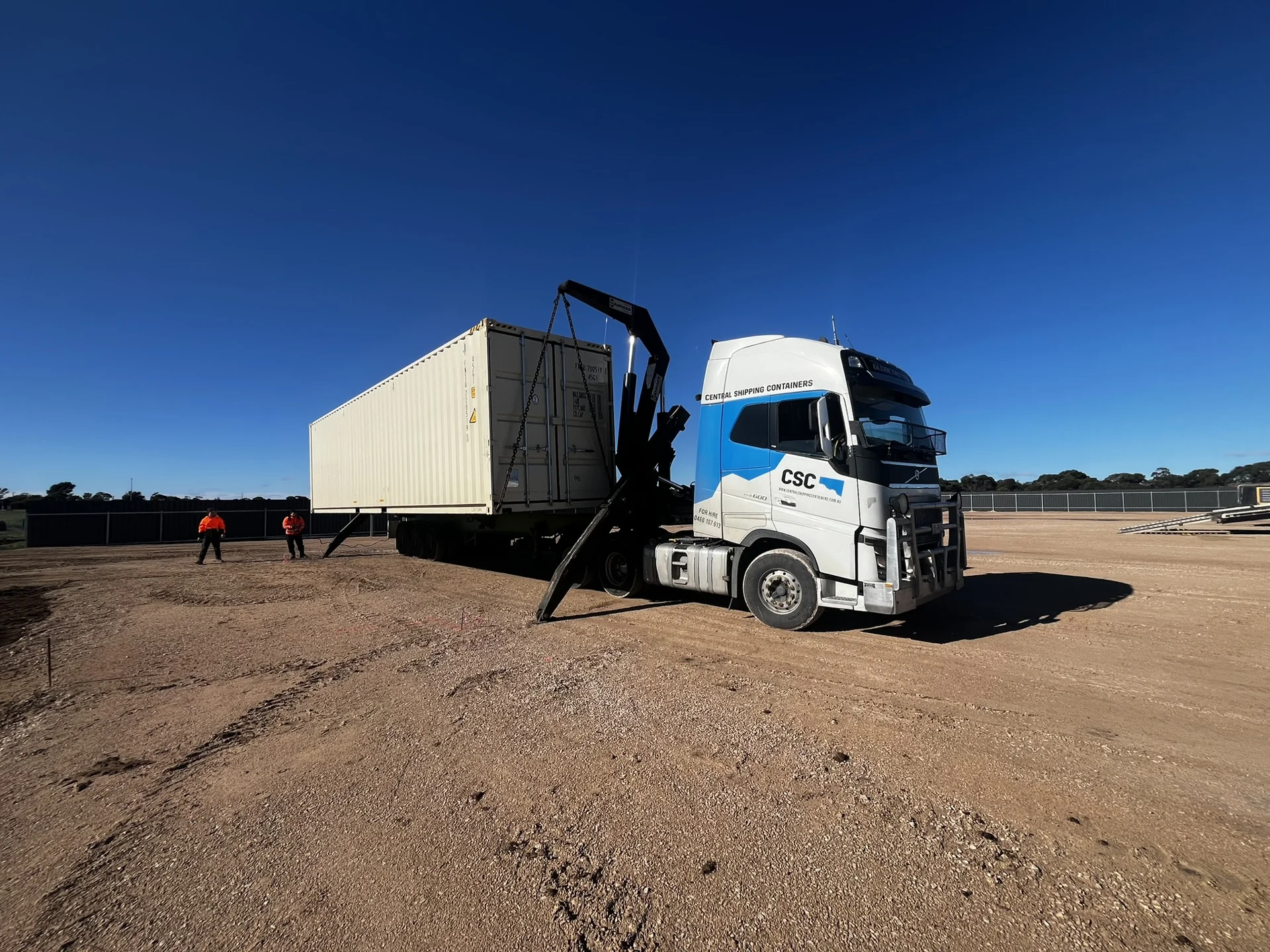 View photograph: container delivery truck